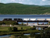 NBEC Mirimachi turn returning to Campbellton crosses an inlet of the Baie Chaleur on the eastern outskirts of Campbellton. Quebec's Gaspe peninsula lies across the Bay