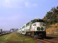 GO Transit train 918 behind year old GMD F59PH 520 zips eastbound towards Union Station alongside the busy Gardiner Expressway just east of Sunnyside.  GO 520 was the first of 49 such units built by GMD London beginning in 1988.<br><br><i>Roger Chapman Photo, Bruce Acheson Collection.</i>