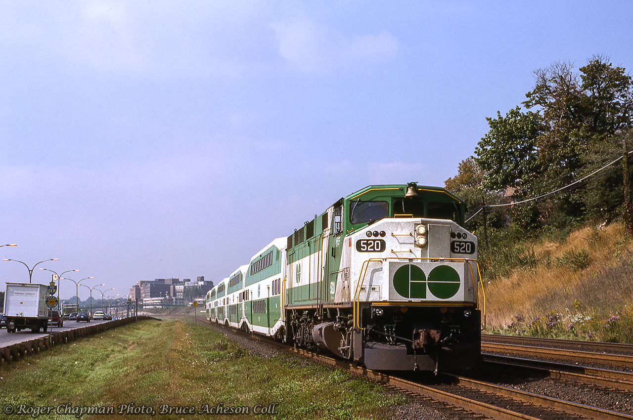GO Transit train 918 behind year old GMD F59PH 520 zips eastbound towards Union Station alongside the busy Gardiner Expressway just east of Sunnyside.  GO 520 was the first of 49 such units built by GMD London beginning in 1988.Roger Chapman Photo, Bruce Acheson Collection.