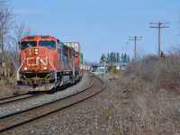 With the recent removal of most of the old telegraph poles on the CN Bala mainline from Toronto to Washago, the S curve looking north through Gormley provides a refreshing reminder of the railway's past. With dynamic brakes whining, a venerable duo of EMD SD70/75 series diesels roll Q108 south towards Doncaster.