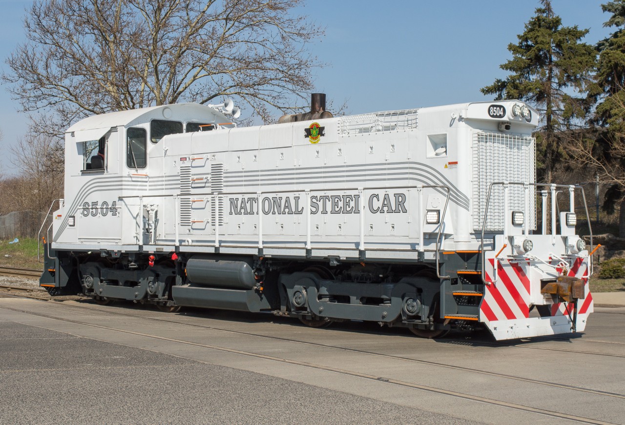 NSC 8504 heads light engine back to the shops after dropping a cut of unpainted hopper cars at the paint booth.  8504 made that single move this morning before being parked and shut down in favour of one of the yellow centre cabs.  It seems the SW1001's aren't quite ready for regular use!