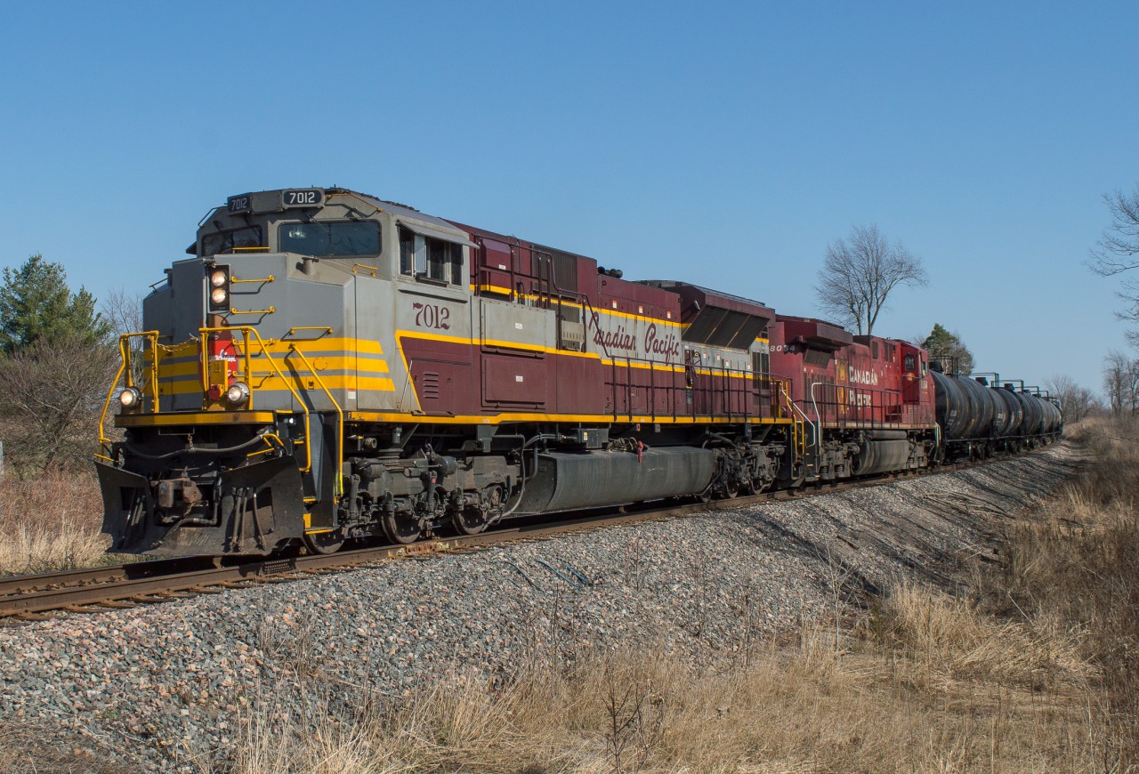 CP 7012 leads 237???  North through Milgrove on a very warm April afternoon.  This train was reported to me as a 237 but appeared to have came in to Buffalo as a late 132...the back 75% of the train was intermodal while the headend was cars from Hamilton and Welland.  With tomorrow marking the first day of the CPKC era, I was happy to have this as my last "CP" train.
