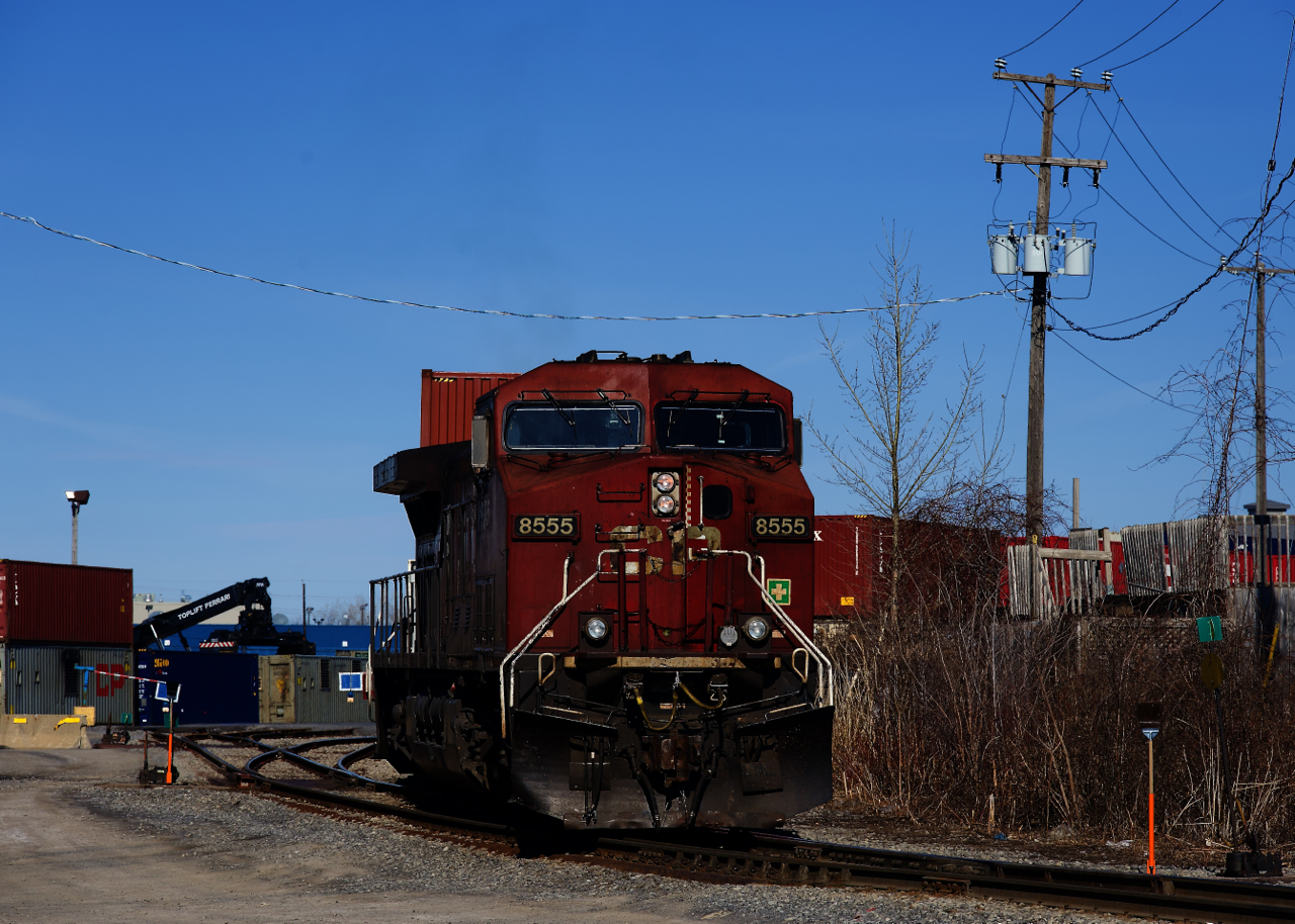 CP 8555 brings up the rear of CP 112 as the last cut of cars on the train get brought into Lachine IMS Yard.