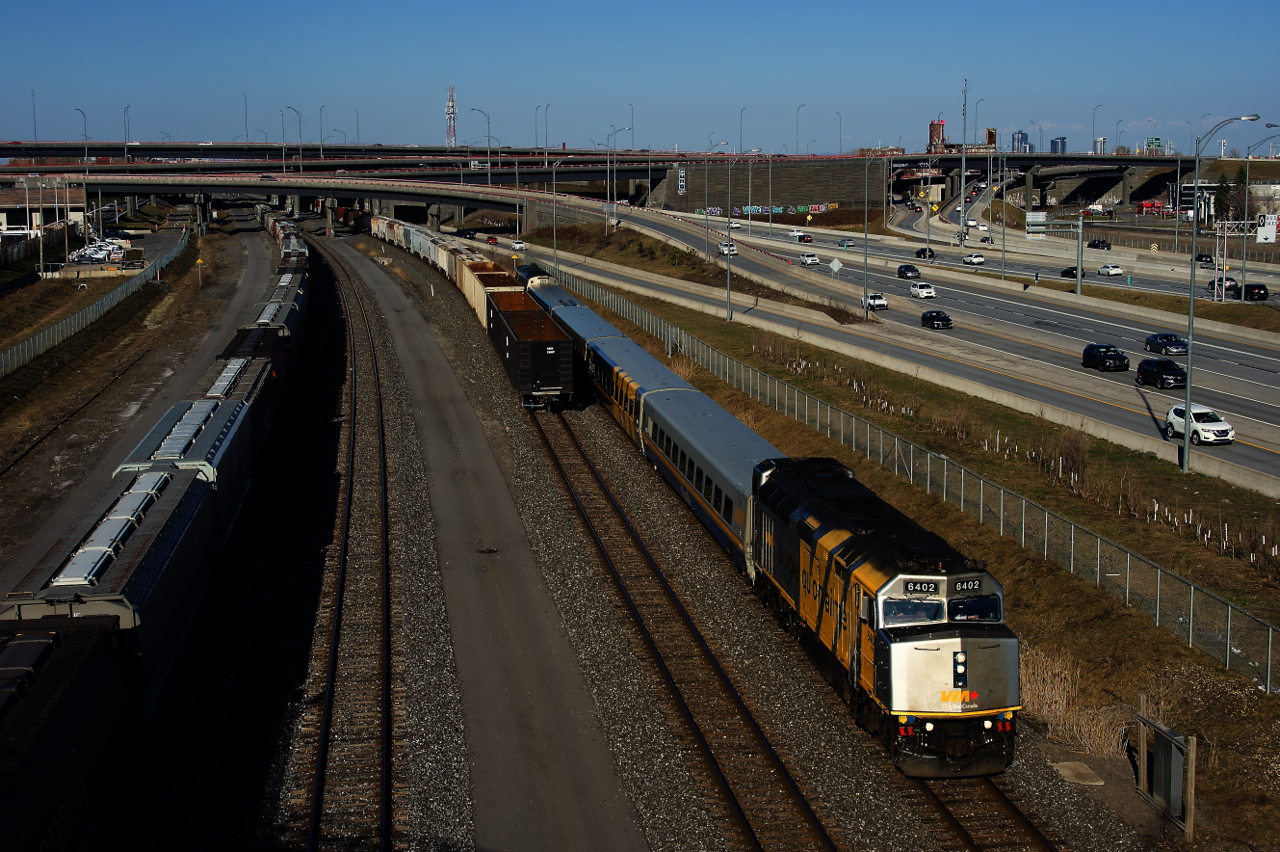 CN 527's tail end clears just in time to get a shot of VIA 6402 leading VIA 69. VIA 6402 had been out of service for quite a number of months.
