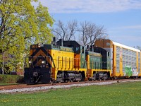 It's a beautiful spring morning as ETR 104/105 work a cut of auto racks for the CN at Windsor Ontario.