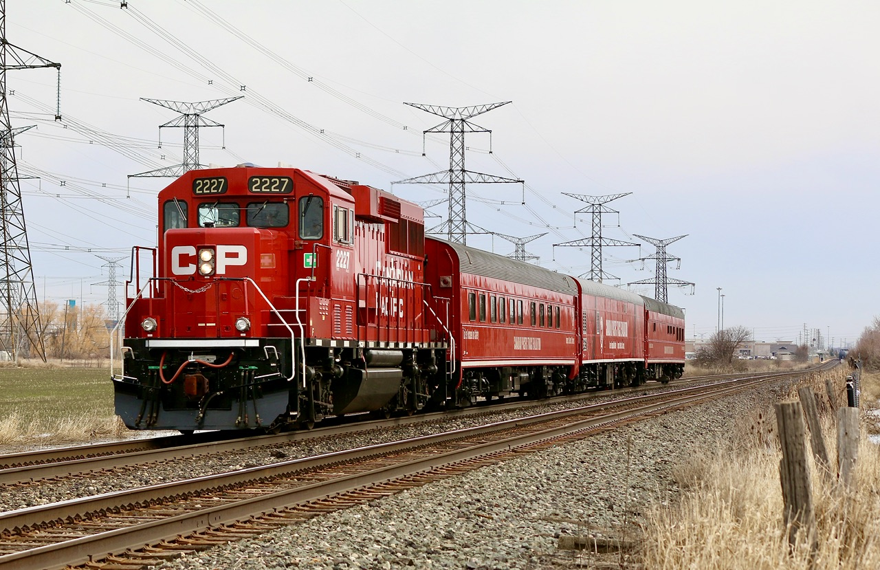 CP’s TEC train does look pretty sharp in solid red. Here it is seen after passing local H24 seen disappearing in the distance. Today it is seen London bound, testing along the way.