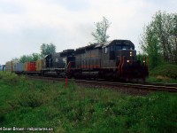 CN EB with GECX 6052 and IC 6014 heads eastbound on the CN Halton Sub towards Mac Yard. 