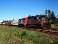 CN 339 with GECX 6068 and GTW 5925 eastbound approaching Georgetown on the hot sunny evening.
