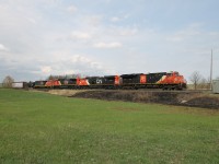 CN 3231 and CN 3316 are in the lead with CN 2122 and CN 2452 dead-in-tow as 397 passes one of the non-prescribed burns which occurred on the Halton Sub. yesterday. I presume the DIT units are heading state side for final disposition. 