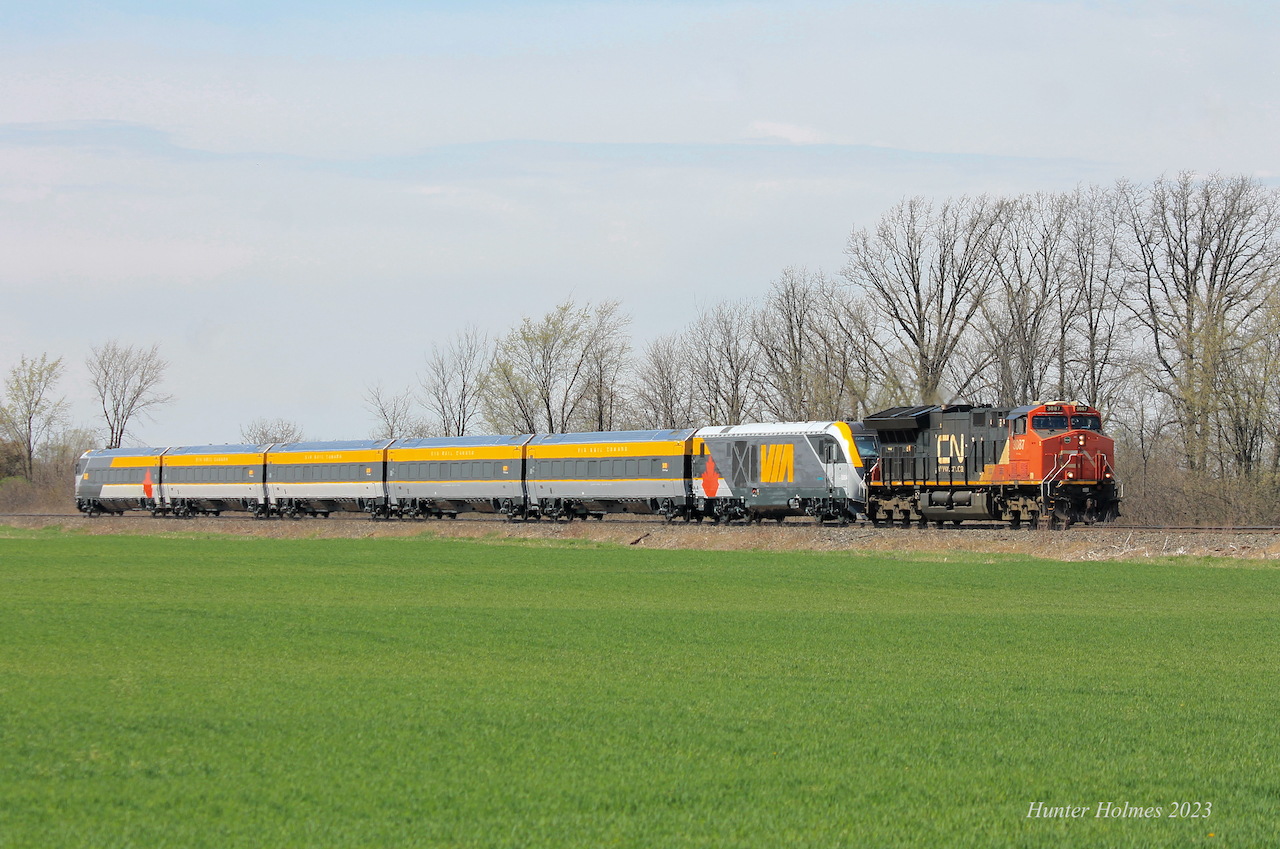 CN P27691 18 is seen on the approach to Mandaumin shortly after departing Sarnia. Having captured the first trainset entering Canada, and some testing on the Chatham Sub (both at night), it was nice to see one of these new Siemens sets in the daylight. I must admit, they look pretty sharp.
The consist of this delivery extra is:

CN 3087, SIIX 2204, SIIX 2603, SIIX 2703, SIIX 2803, SIIX 2303, SIIX 2903
