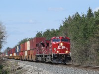 Approaching the Highway 26 crossing, 8164 and 7000 roll a long intermodal south with 8008 pushing on the rear.