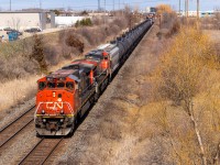 CN 435 slows their train down as they approach Burlington West with a pair of 'Canadian Cab Dash 9'C44-9WLs. BCOL 4641 is one of 4 purchased by BC Rail and the only one painted into CN colours. The trailing unit, CN 2517, is one of 24 units bought by CN. With these units up next on the perverbial chopping block for CN, it's always a good day when one leads. A pair is a rare treat!