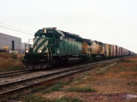 NS 328 with EX BN CEFX 7120 SD40-2 and UP C44-9W 9685 through St. Catharines on a Dull crapy day. Manage to get it as is with cloudy conditions.