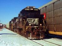 NS 328 with NS 8836 creeps up to Nelles Rd. as they meet 332 going westbound on the north track through Grimsby.