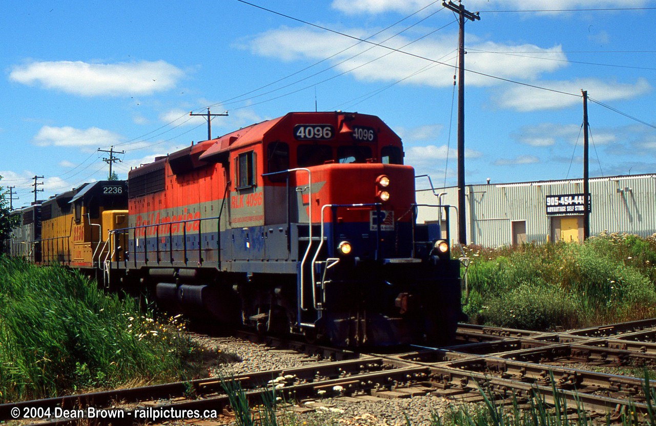 GEXR 432 with RLK 4096 crossing the diamond at Brampton on the CN Halton Sub.