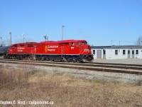 Many of us shot these units on CP for their 25 or so years they were on the roster - the first time. Pretty amazing to see these units be sold to CMQ in 2015, only to come back in the CMQ purchase in 2020 and actually get repainted. This one was repainted in late 2022 at Progress Mayfield after overhaul and arrived in Canada in early 2023 and has spent time in Toronto with boarded up cab window(s) trailing with other yard engines. But now, it seems it's able to lead and was dropped off a couple days ago in Welland for the local job. I figured I'd go after Easter, but decided to give it a shot today after my family delayed our Sarnia plans by a day. This was a total crapshoot because H61 is not scheduled to run on Fridays. Luck was on my side as I arrived to mechanical finishing working on 9014 and a crew taking the units to switch the yard, after a couple shots  bolted out of town to see friends and family - it's Easter after all. While I was visiting friends I found out that 239 lifted 9014 and has taken it back to Toronto for whatever reason.. unreal.<br><br>
Pictured is H61 (or whatever they call an extra) passing the Penn Central 1973 built (shared with TH&B) spartan cinder block station and yard office - which went into Conrail then fully into CP after they absorbed both railroads in Niagara Region fully. This station even survived into VIA service when the Toronto-Buffalo RDC's were cancelled in 1981. I would ride a CP passenger train with 2816 to here in 2004 and this is where we got off, so occasionally it does still see some passenger service :)

