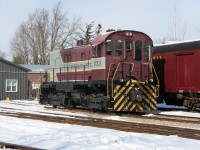 Waterloo Central Railway (WCR) S13 1001 is viewed outside the tourist hauler’s shop facility in St. Jacob's, Ontario during a winter afternoon. 
