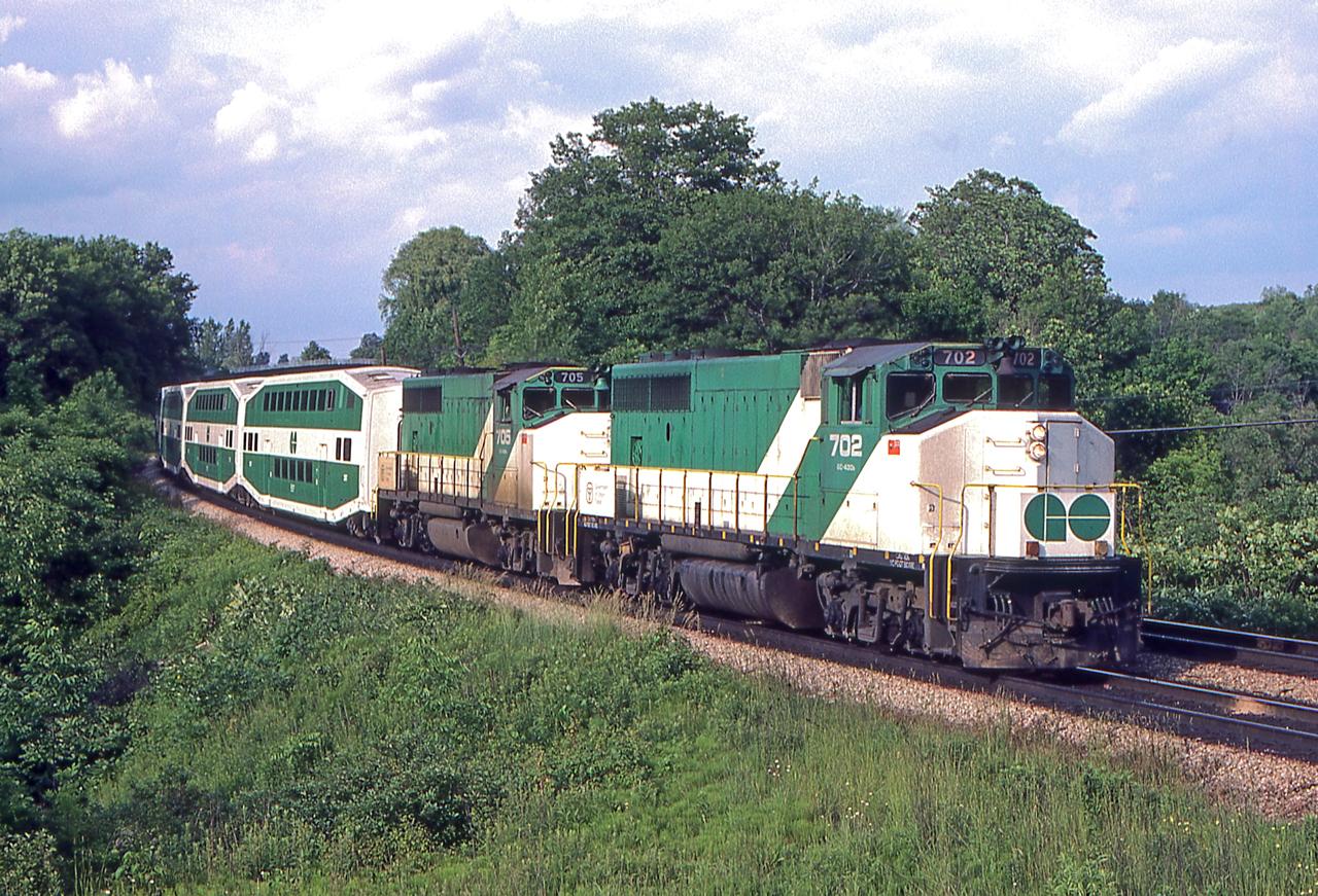 GO 702 is westbound nearing Bayview Junction, Ontario on June 20, 1980.