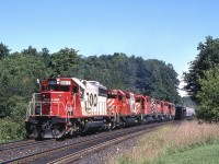 Peter Jobe photographed CP train #503 with SOO 6617, CP 5698, 5545, 5526, 5414, and 6613 on the point. He took this in Campbellville, Ontario on August 24, 1986.