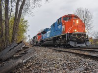CN 527 is on its return trip as it heads back to Southwark Yard from Taschereau in Montreal, Qc. CN 8952 is in the lead, an SD70M-2 painted in GTW paint as a heritage unit.