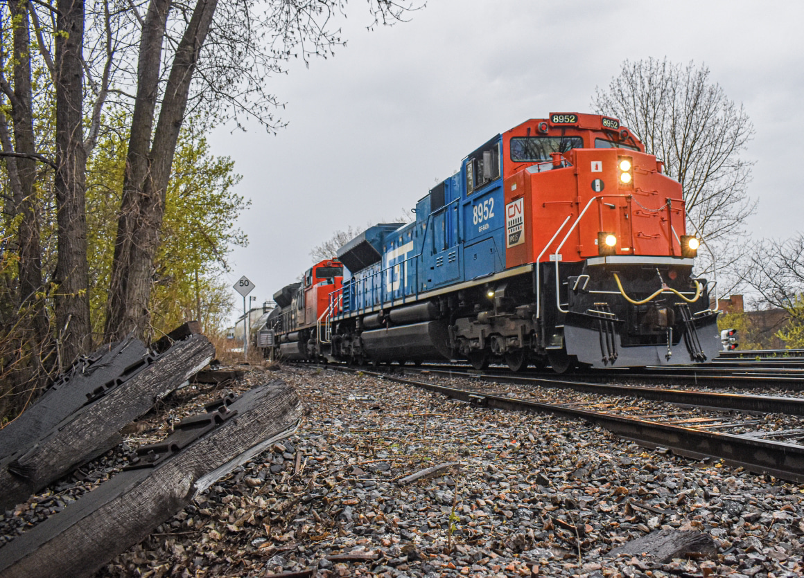 CN 527 is on its return trip as it heads back to Southwark Yard from Taschereau in Montreal, Qc. CN 8952 is in the lead, an SD70M-2 painted in GTW paint as a heritage unit.