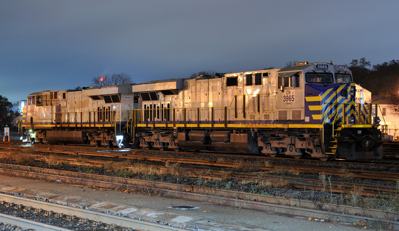 CN 3965 and CN 3945 are pictured tied down at Brantford after assisting a westbound up the hill earlier in the evening