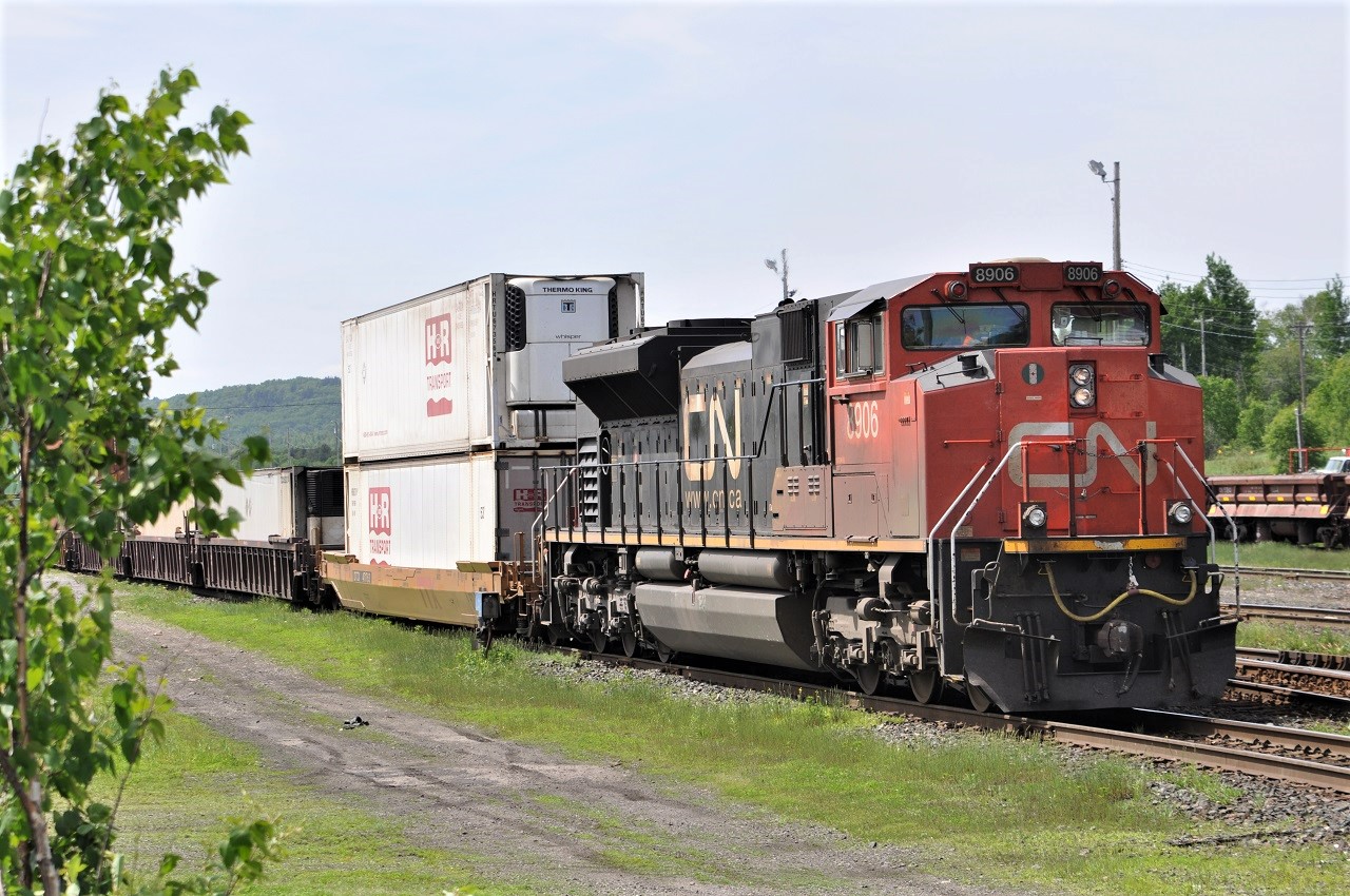 CN SD70M-2 8906 has changed crews in front of the Capreol Yard Office and begins its run to BIT in suburban Toronto on one of CN's many intermodal trains.  Sister 8880 is working as the mid train DPU.