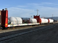 CNFD 100004, CNFD 100005, and CNFD 100006 make up the 'Poseidon' fire fighting consist that is sitting ready in CN's Kamloops, BC Yard on May 3, 2023. <br>
The threat of wild fires was already in the news as I rode VIA 001 The Canadian westbound on this April 30 - May 4 trip. I'm sure these purpose built cars and their support crew were pressed into service in the coming days.