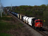 CN 368 has 149 cars as it heads east with ex-GECX 3131 up front and ex-CREX unit CN 3983 mid-train.