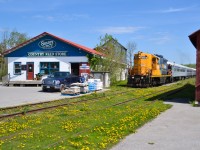 In light of a recent power shortage, the York Durham Heritage Railway has reached a deal with Ontario Northland to lease out an old high-hood GP9 for the near future. After a tumultuous delivery journey and several arguments between CN and Metrolinx over who should deliver it, the ONT 1603 is seen departing Uxbridge on a sunny May morning with a long train full of locals and tourists.