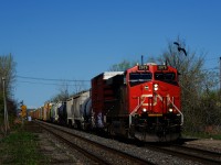 A bird is getting out of the way as CN 368 approaches Dorval Station with its usual 1+1 GE power (in this case, CN 2979 + CN 3074).