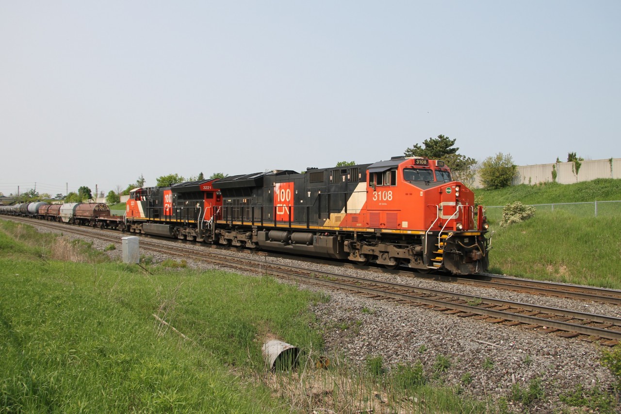 Wearing matching CN 100 livery CN 3108 and CN 3221 are leading M397 today on the south track of the Halton Sub. at Mile 44, Halton Sub. toward Burlington West.