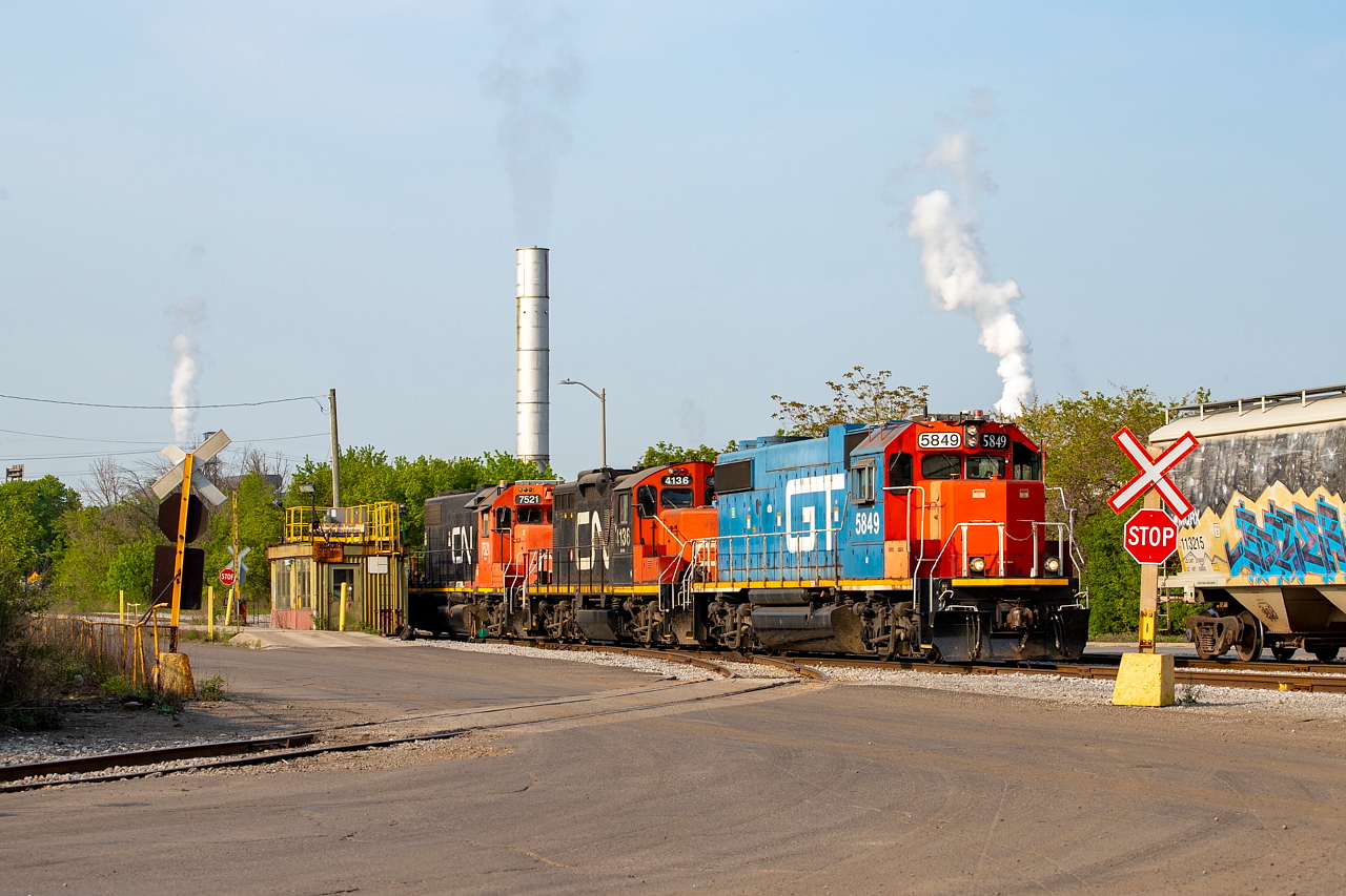 0700 Yard running around their train on the former Stelco Rod Mill trackage, preparing to switch out Parkland Fuels.