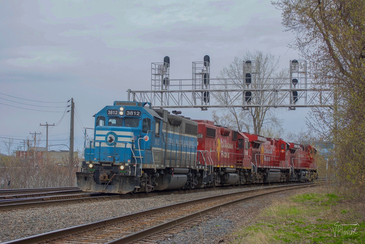On April 26, 2023, the CPKC G95 passes Outremont Junction with a Central Maine & Quebec GP38 in the lead! The Outremont Junction connects with the Parc, Adirondack and Outremont Subdivisions.
