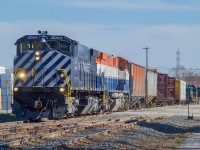 On May 7, 2022, a pair of ex-BCRail MLW M420s have just returned from CN's Joffre Yard and are maneuvering at Scott Terminal. We see behind the train the two other locomotives of the company, also MLW.