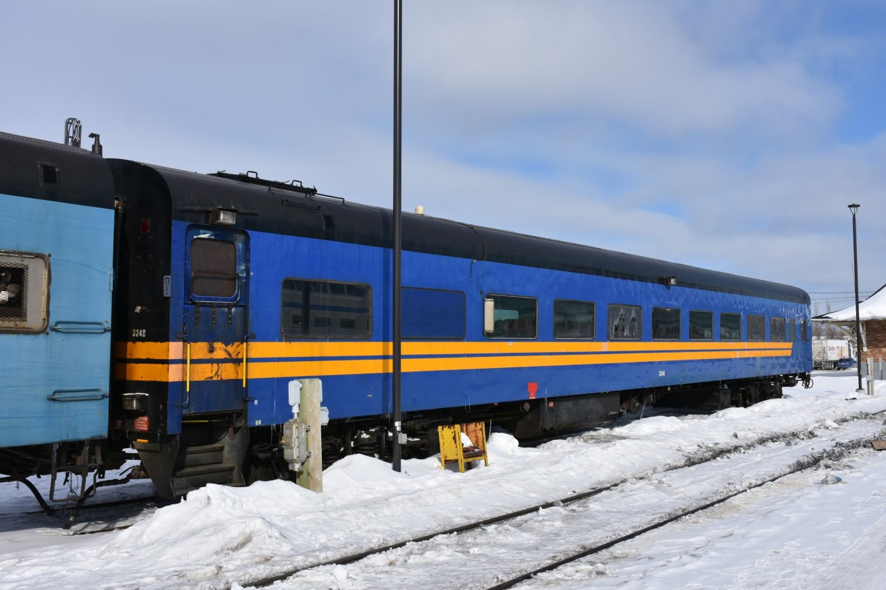 Not required on KRC 291 The Pukatawagan Mixed this cold, sunny March 16, 2023 day, KRC 3248 (ex-VIA 3248, exx-CN 3248, exxx-CN 5454) Class PB-79-A 1st class car, CC&F built 1954, is left on a stub track at the south end of The Pas, MB VIA station. 
There are a total of four ex-VIA/exx-CN passenger cars in The Pas available for use on the Puk Mixed. Only two (1 baggage and 1 coach) were needed on this day.
