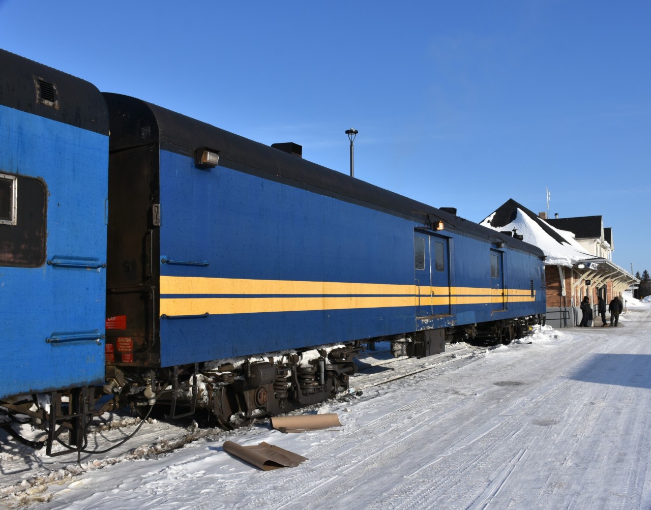 The last of the four ex-VIA/exx-CN passenger cars I photographed while in The Pas, MB this past March, and now lettered for Keewatin Railway Company is KRC 9631. 
KRC 9631 is (ex-VIA 9631, exx-CN 9631, nee-CN 9250), a Class BE-73-H, 73 foot 6 inch baggage car. It was built by NSC in 1955. 
This car houses two diesel driven generators (one running, one backup), a large furnace for keeping the baggage compartment warm during the brutally cold winter months, and a large open area for carrying baggage, supplies, and other items for the long journey of the Pukatawagan Mixed. 
Having access all around the exterior of the cars where they were stored, and then a full tour on board once the 'Mixed' was made up was an experience I will long remember. The KRC train crew and local supervisor where a great bunch of guys and welcomed all my requests for information and photo opportunities. :-)