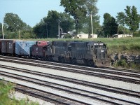 I'm on the opposite side from Bowen Road in Fort Erie near CN Duff, where I crossed. Did not shoot from here very often.  This is late day, and NW 4160, 4161 (nice to see consec numbers!) with train ready to depart westbound. Don't recall other times when I noted a caboose, (#518567) behind the power so not sure if this is the thru train to Detroit but the time of day was right.
Behind the caboose, the "I Love NY" boxcars were a popular sighting feature back then, especially on the D&H.