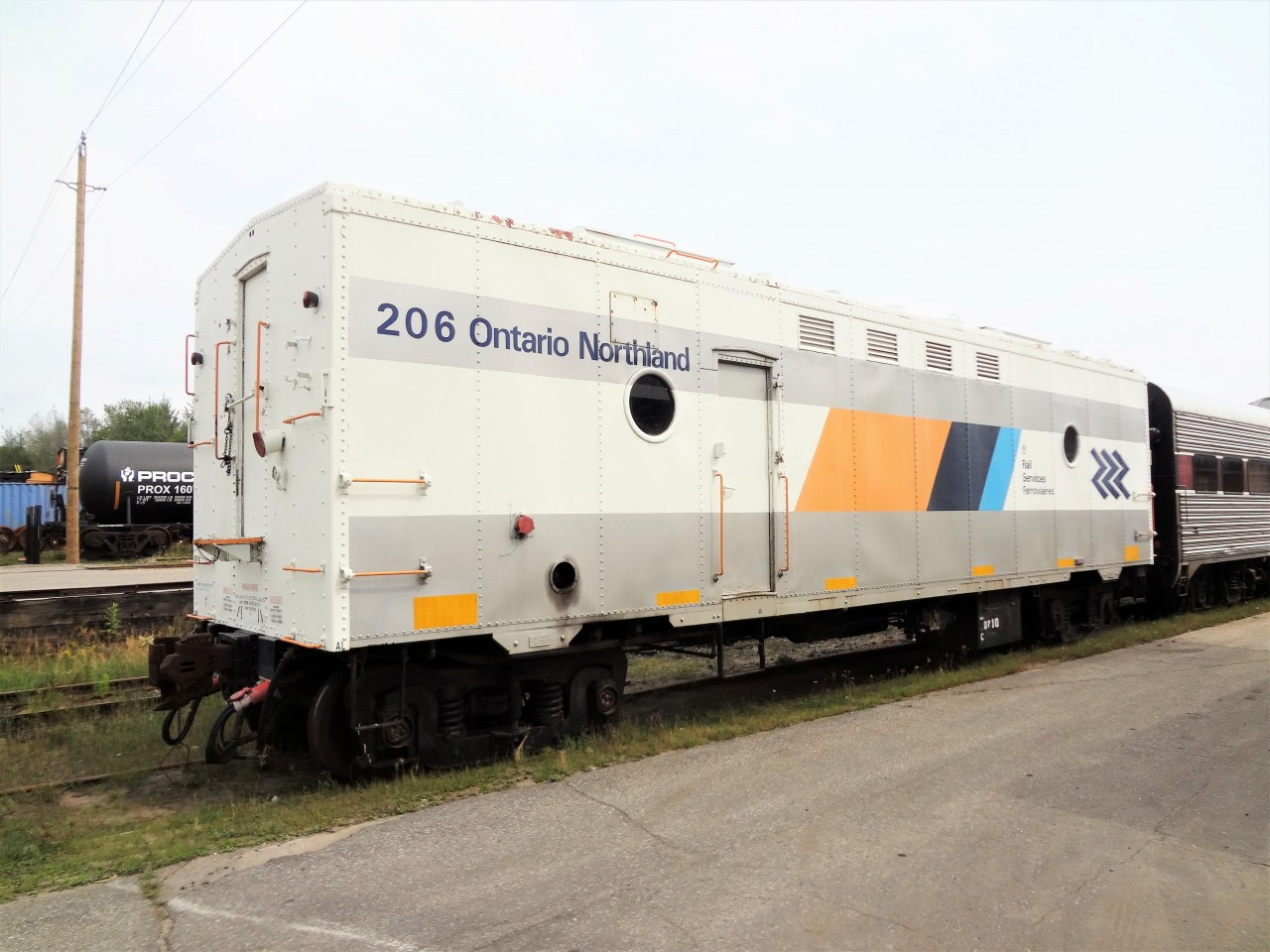 ONT 206 (ex-BCOL 159, exx-VIA 15483, exxx-CN 15483) sits in line with several other pieces of passenger equipment after being prep'd for a trip to a western Canada museum destination. Taken during a work related visit to Ontario Northland facilities in North Bay, ON September 2, 2015.
