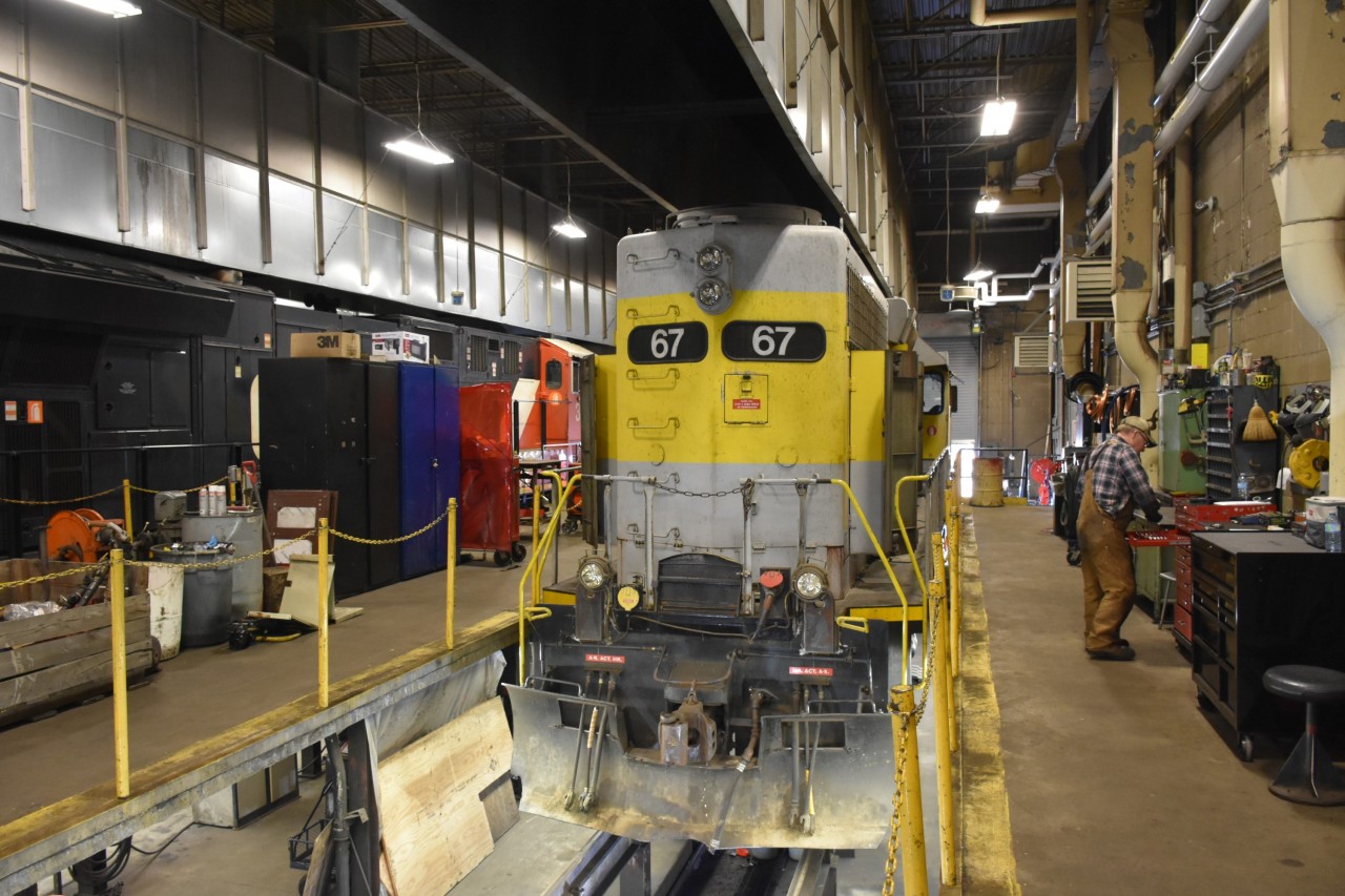 RS 67 is far from home rails as she receives some mechanical attention inside the ONR diesel shop in North Bay, ON on April 13, 2023. Sitting on one of the elevated service tracks, RS 67 is keeping CN 3273 on the next track company during her visit to Ontario.