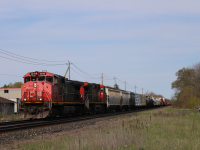 CN A435 passes by Woodstock with a nice Canadian cab leader
