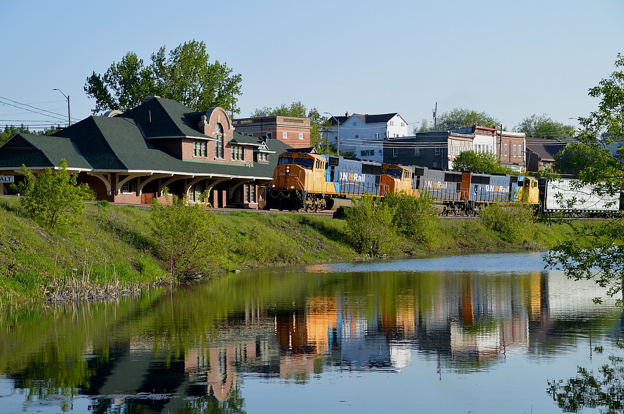 The 'crack of dawn' train for North Bay, usually out of Englehart before 0600, is seen here in the early morning sun rolling past the historic Cobalt station. Power is ONR 2104, 2101 and 2105.The Ontario Northland finally moved into the "big time" with the acquisition of six new SD75I locomotives in 1999. Currently five of them are still active, with first delivered 2100 lost in a derailment back on 2011..
The Cobalt station looks to have been renovated, and is currently listed for sale. Talk about a railfanners headquarters !!!