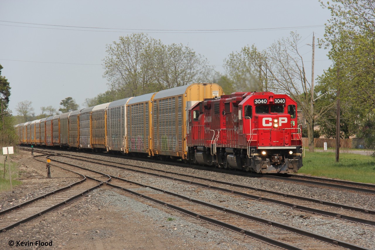 Ayr, ON. May 17, 2023. While waiting for CP 137-17 to show up, I shot train 1 of 2 - the Hagey job led by CP 3040 and CP 7307. Train 2 of 2 (137) was closely behind. I could hear the horn as the train was approaching Ayr. Shortly after, they went into emergency. The fact that the train derailed still didn't cross my mind. However, radio conversation on the situation soon revealed the severity of the situation. Part of the mid-section of the train derailed at mile 65 between Cedar Creek Rd. and Alps Rd. First time for me experiencing a derailment in real-time while railfanning. Expect the unexpected in railroading.