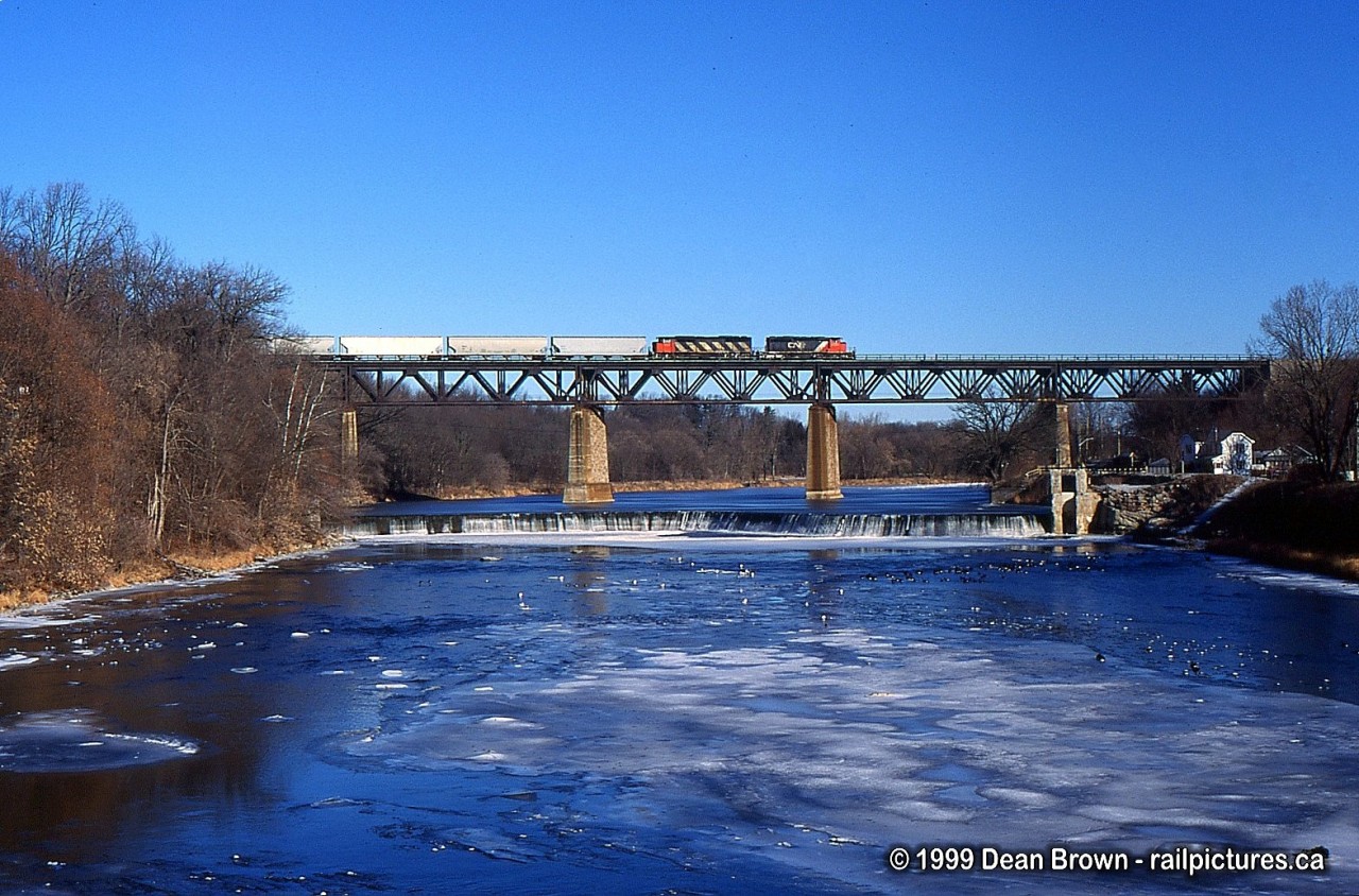 CN Eastbound with CN 5359 East crossing the Grand River on a Cold winter morning in Paris, ON.