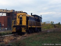 PCHR 308 returning back to Merritton after switching the Domtar plant, the Domtar Steam plant in the background is gone. All new homes are being built.