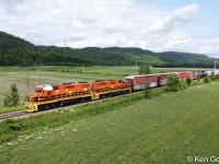 On its way from Ste Thérèse to Buckingham the QG freight runs along the edge of the Grenville Fault that marks the division between the Montreal plain and the Canadian Shield.
