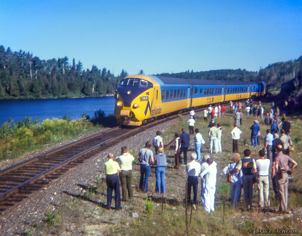Along the shores of Lower Redwater Lake, a four-day UCRS excursion utilizing ONR's TEE equipment from Toronto - Moosonee and return is seen during a photo runpast about 15 miles south of Temagami.  Further information can be found on Reuben S. Brouse's photo HERE.Geotagged location not exact.