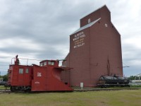 CN 55351 is a steel wedge-type snow plow built in 1928 for service on the CNR by the Eastern Car Company in Trenton, Nova Scotia. It also saw service on the CN in western Canada until its retirement. Located in Big Valley, Alberta, it is now owned by the Rocky Mountain Rail Society. To the right is APXX 80946 water tank car.

