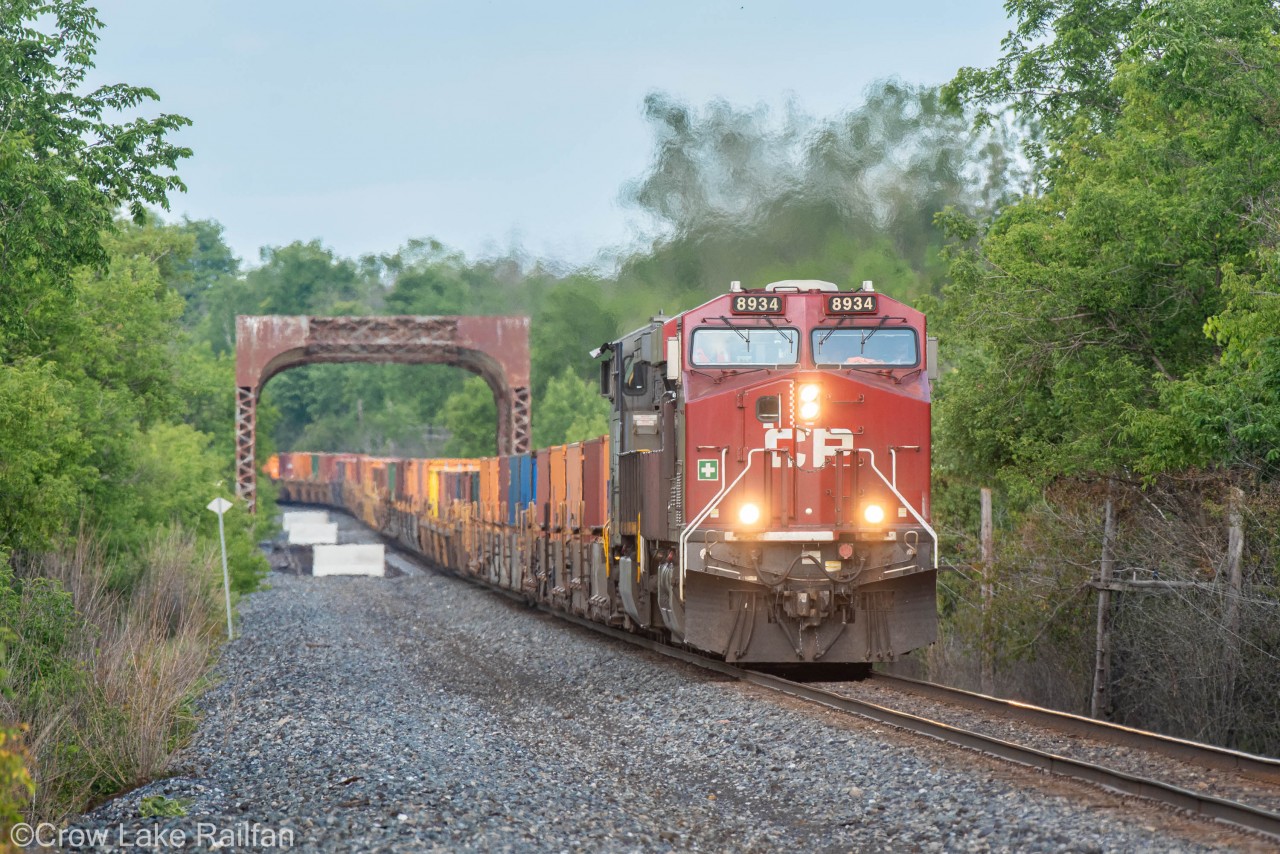 CP 133 thunders over the trestle in Merrickville bringing intermodal to Chicago with a Kansas City Southern "Grey Ghost" in tow.