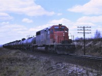 A single SD40, 5081, leads southbound train 474 out of Capreol on May 22, 1969.  The train has a cut of empty tank cars for South Parry on the headend.
